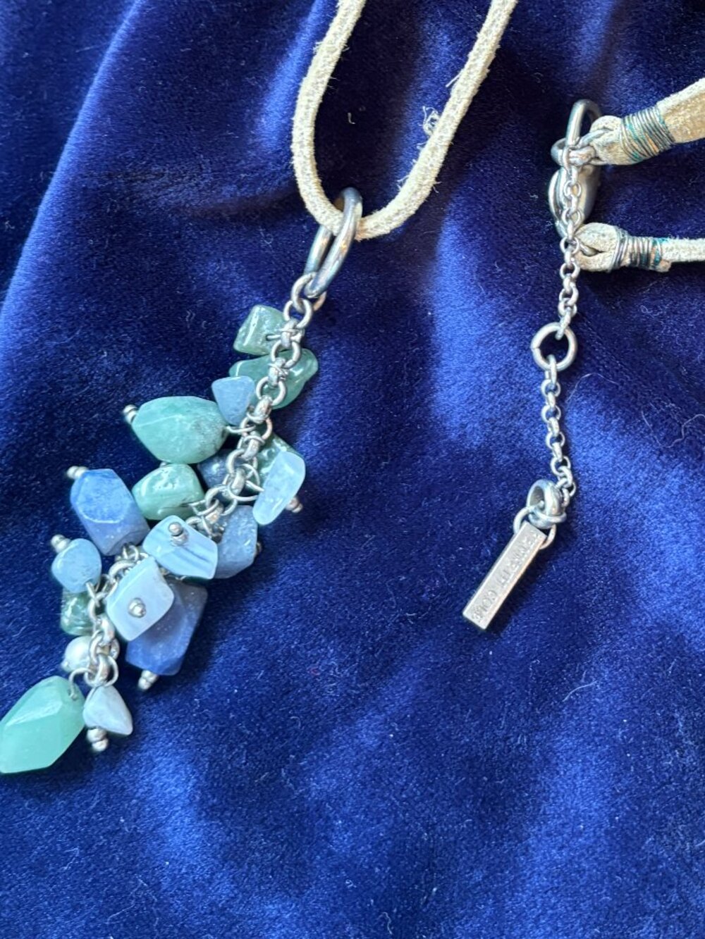 Necklace; 20 beaded/rock crystals on Leather neck band.  Kenneth Cole